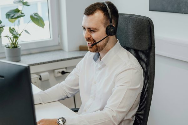 Customer service agent on a call showing customer empathy.