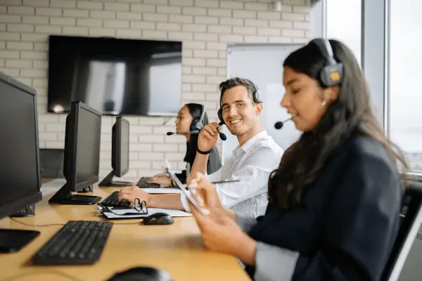 Operations lead calculating customer support cost per ticket across phone, chat and email queues